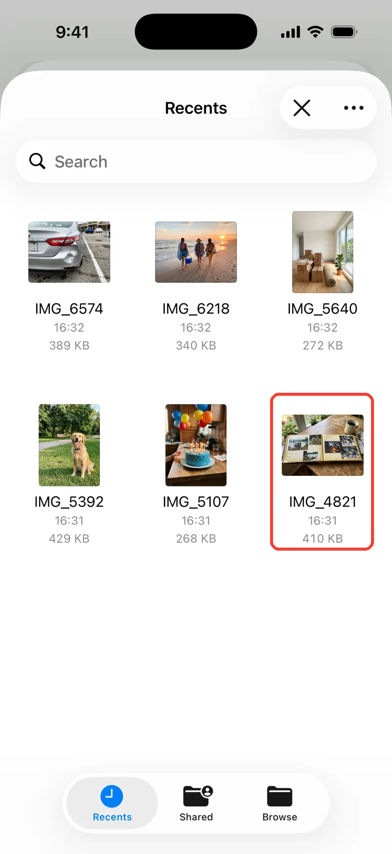 The Files picker with six photos. IMG_4821, a photo of an old photo album, is highlighted